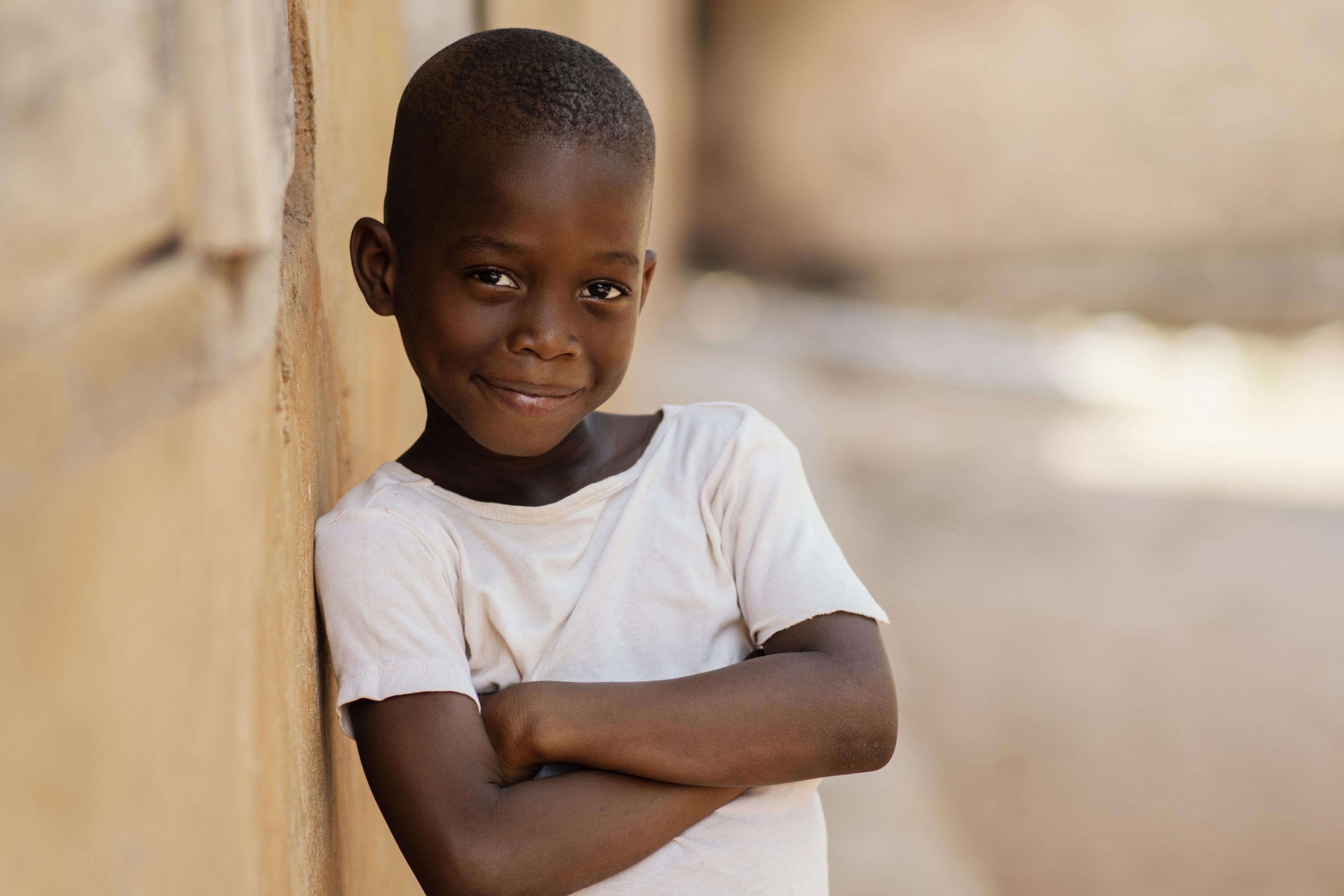 Medium Shot Kid With Crossed Arms
