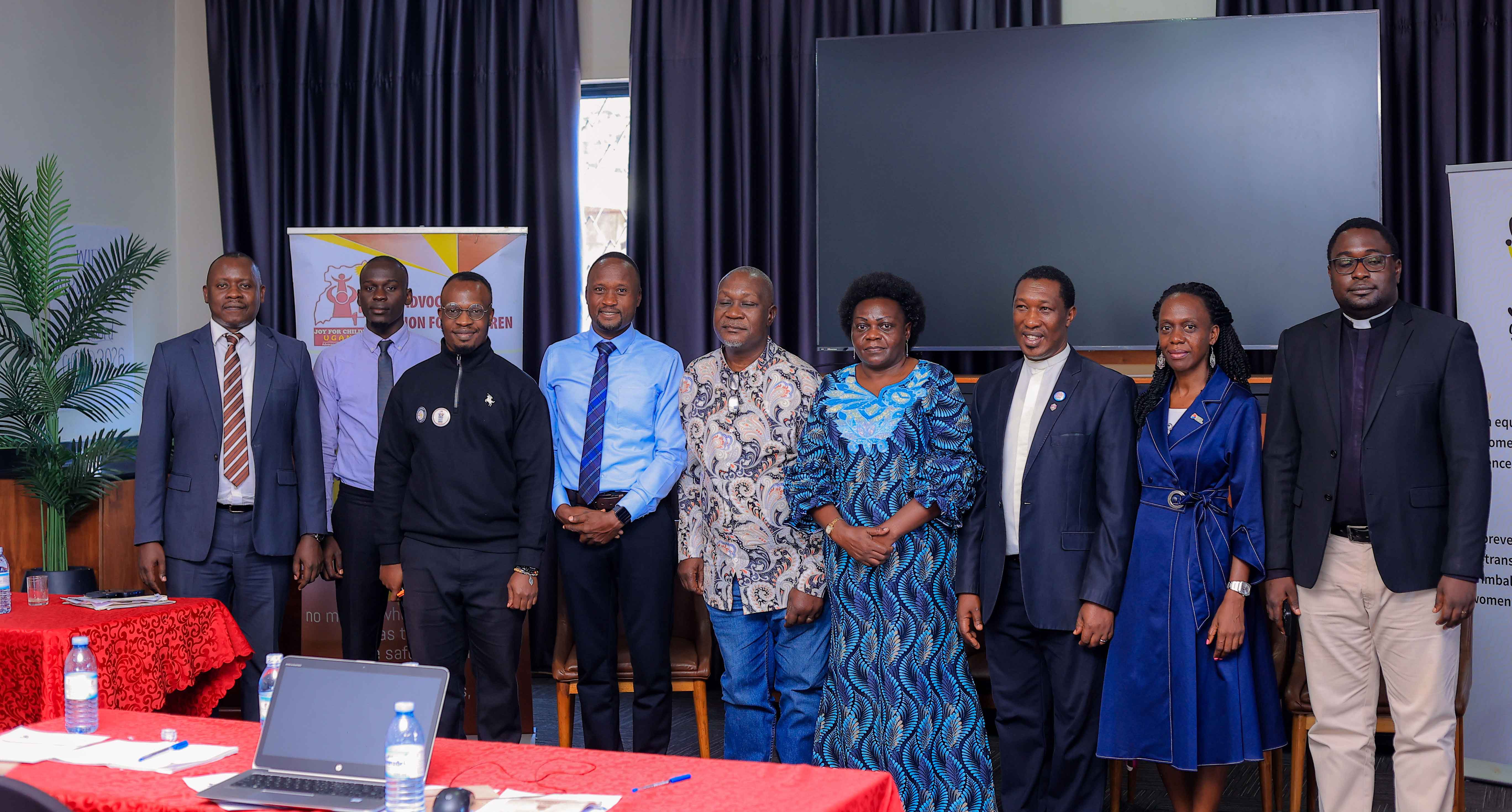 Ntenga Moses, Mondo Kyateka and Sarah Opendi pose for a photo